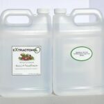 Two large clear plastic jugs with white caps, one labeled 'ExtractOH!'